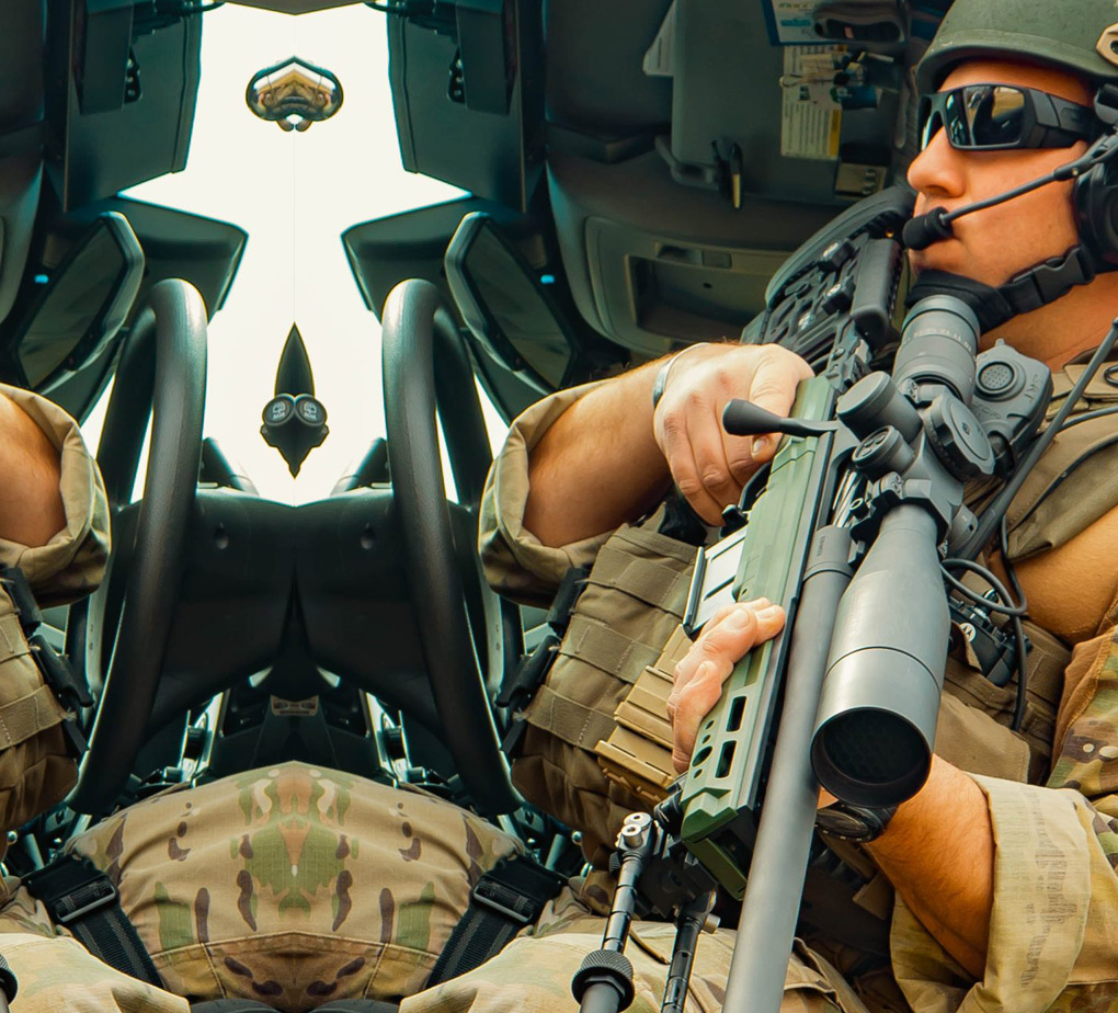 a soldier wielding the paladin long action sniper rifle