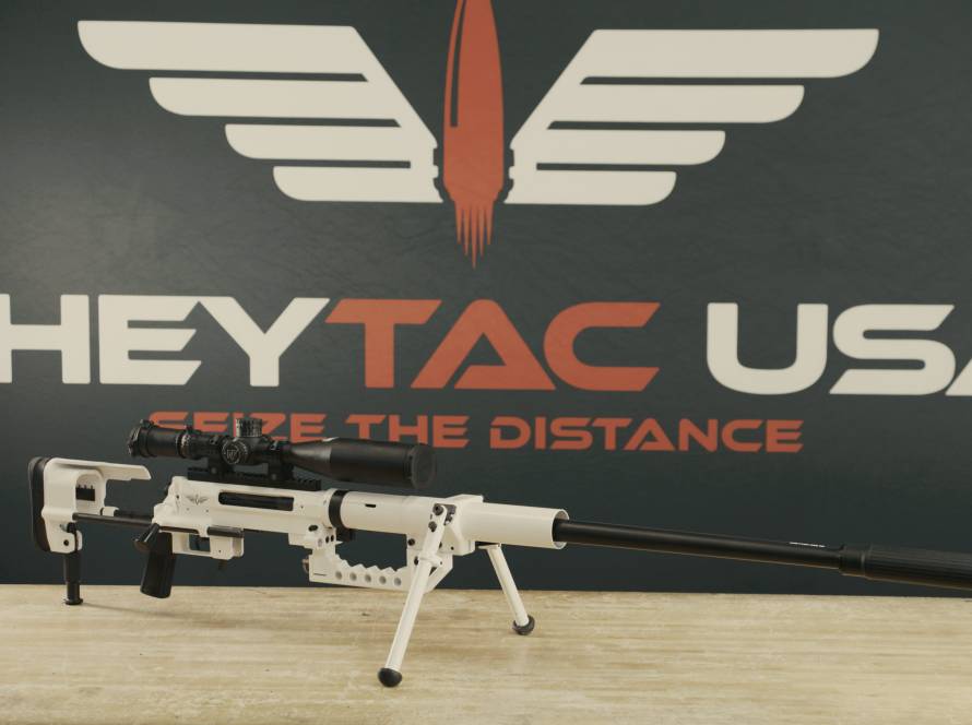 The M200 Intervention sniper rifle on display in front of the cheytac logo.