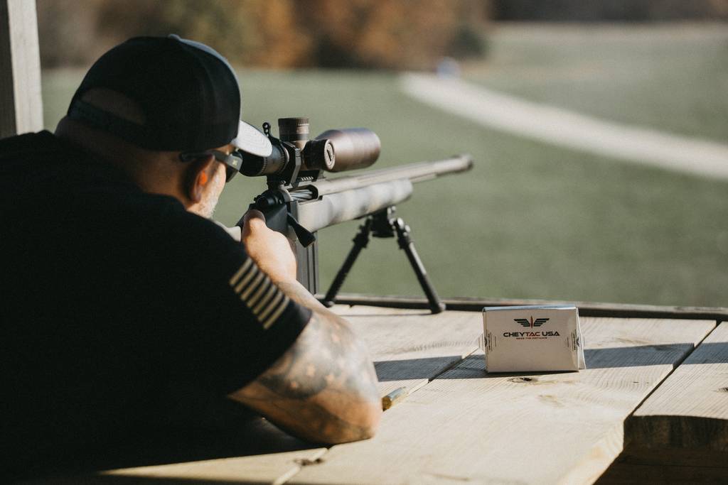 a man shooting the M300 Praetorian sniper rifle on the range